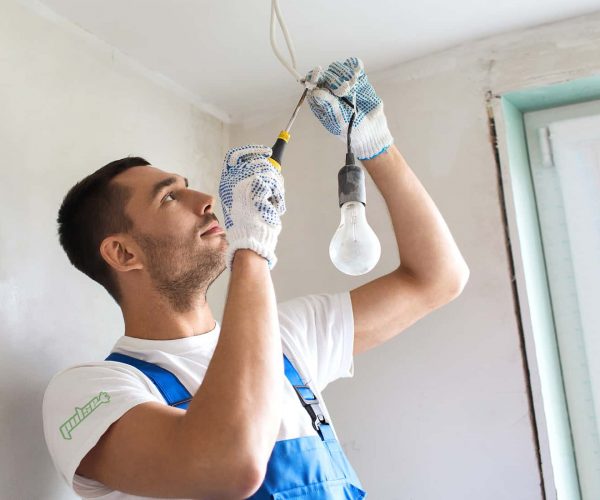 builder with tablet pc and equipment indoors ELECTRICAL SERVICES BUNDABERG